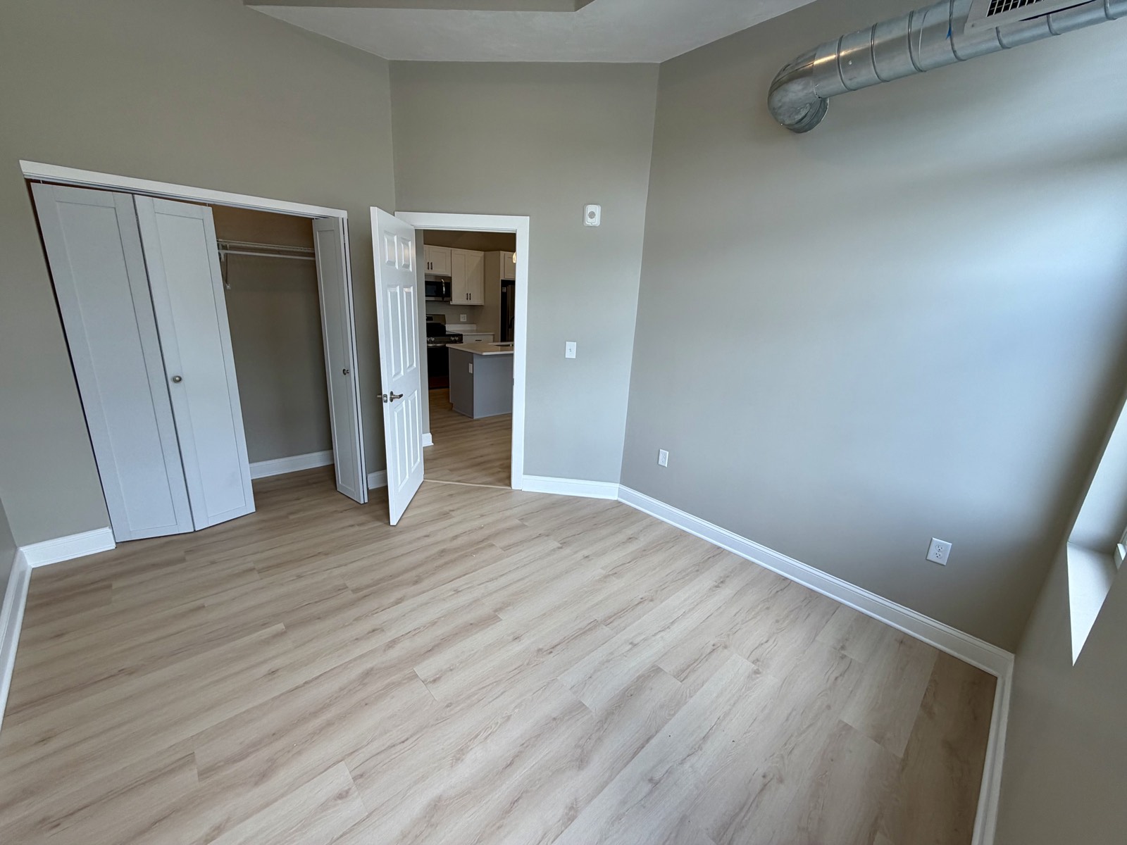 Second bedroom with a full-width bifold closet.