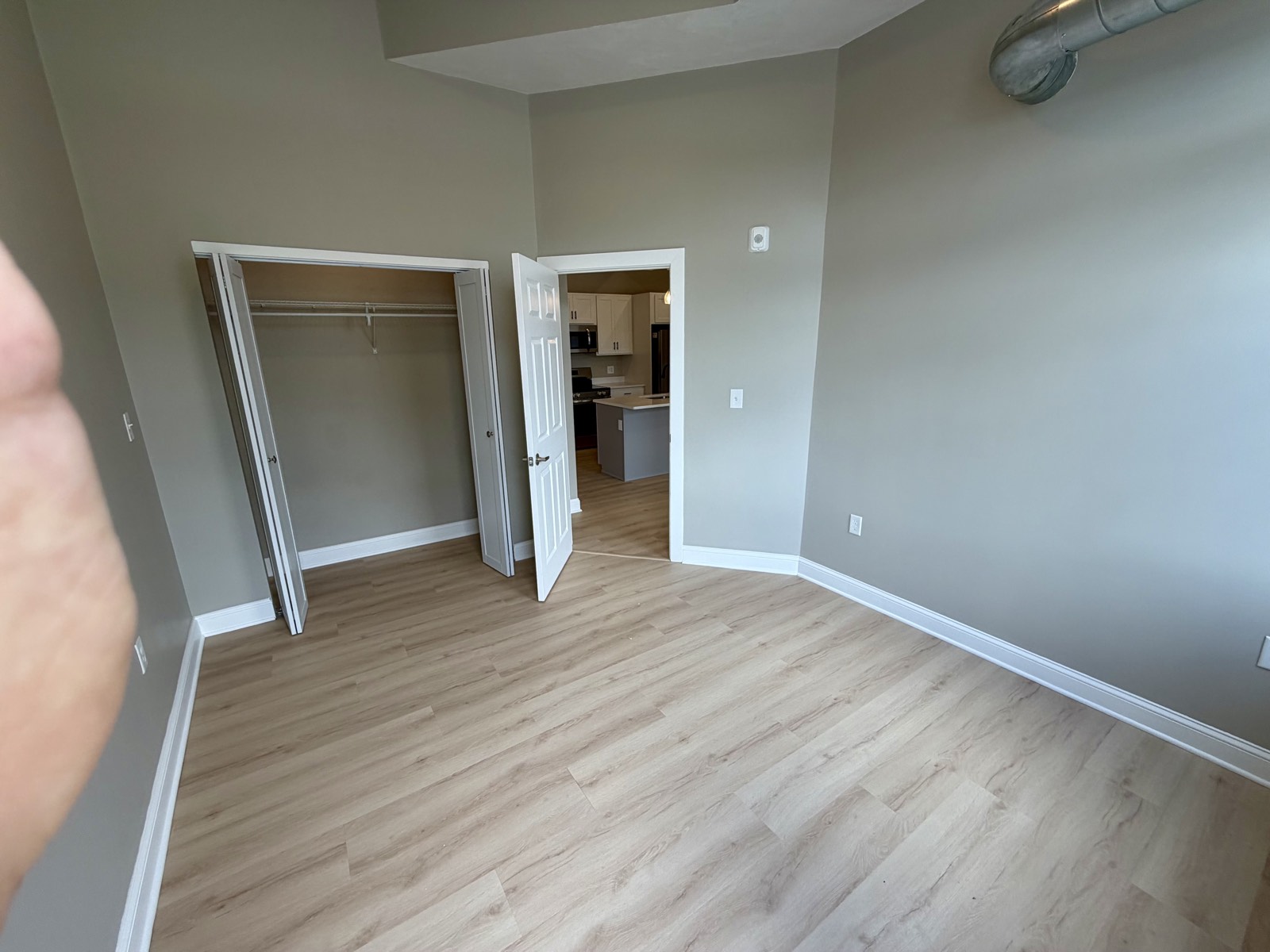 Bedroom doorway and closet opening.